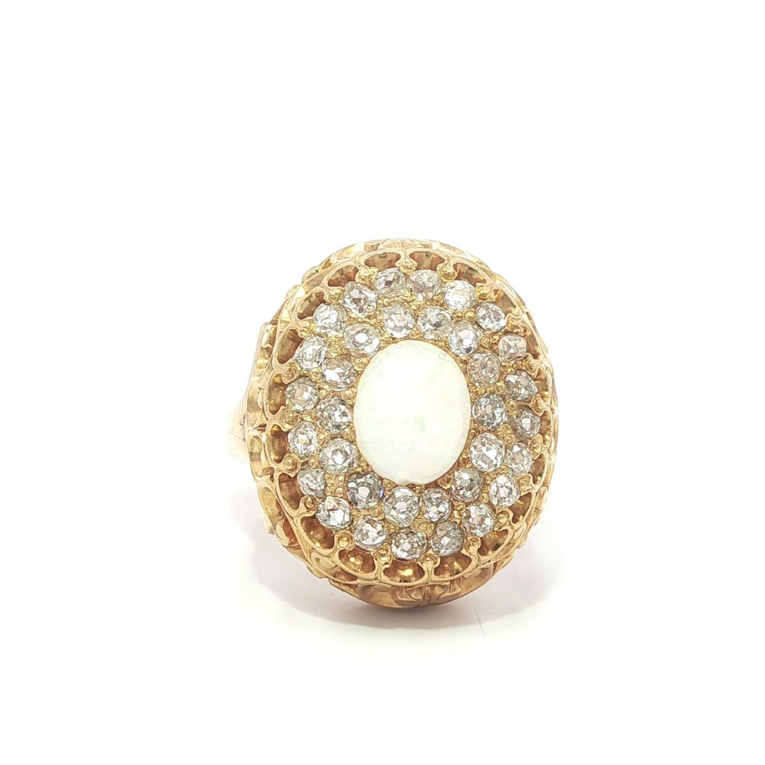 Antique Victorian 18k Gold Opal Diamond Dome Ring 1.02ct: Antique Victorian 18k Gold Opal Diamond Dome Ring 1.02ct This stunning Antique Victorian ring showcases a large natural opal at its center, featuring an oval cabochon cut with a beautiful play of oran