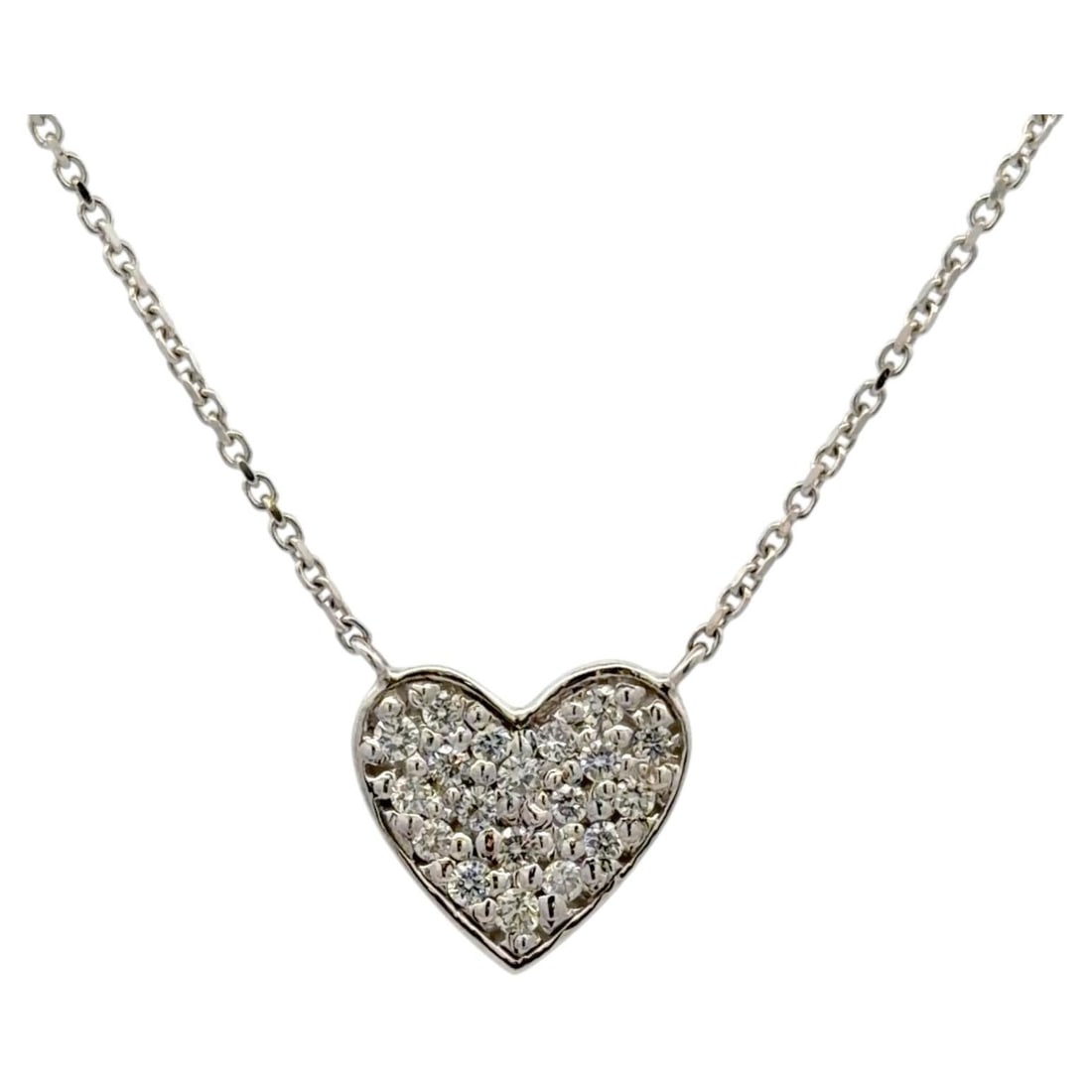 14K White Gold Diamond Heart Pendant Necklace 0.30 Carat F-G VS1-VS2: 14K White Gold Diamond Heart Pendant Necklace 0.30 Carat F-G VS1-VS2 This elegant heart pendant necklace is crafted from 14K white gold and features a pave cluster of round brilliant-cut diamonds tota