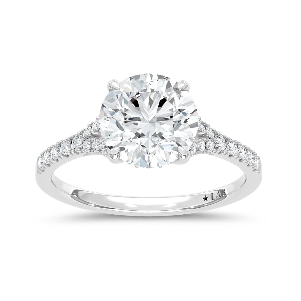 14K White Gold Lab Grown Diamond 2 1/4 Ct.Tw. Round Shape Engagement Ring (Center 2 ctw): 14K White Gold Lab Grown Diamond 2 1/4 Ct.Tw. Round Shape Engagement Ring (Center 2 ctw) This elegant diamond engagement ring crafted in 14k White gold, features a brilliant round-cut center stone of 