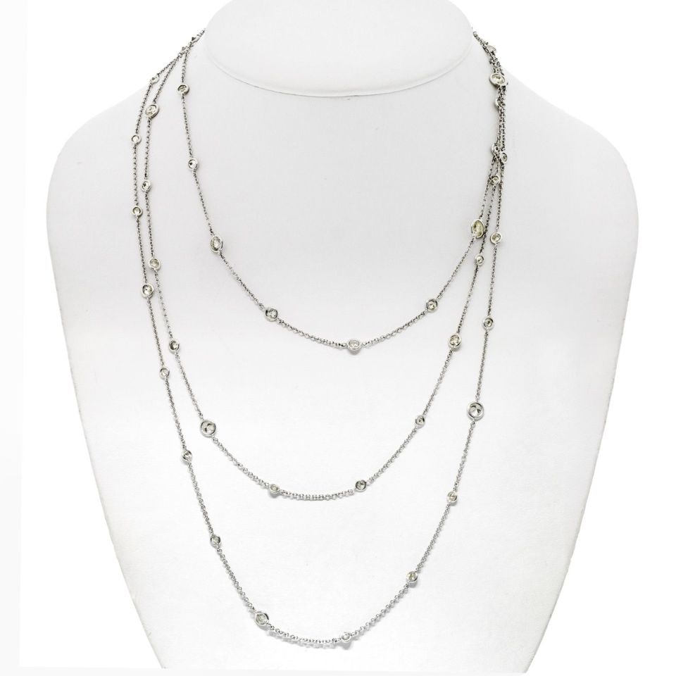 18K White Gold 60 Inch Diamonds by the Yard Necklace 10.6 Cts: 18K White Gold 60 Inch Diamonds by the Yard Necklace 10.6 Cts This exquisite Diamonds by the Yard necklace features 10.60 carats of dazzling diamonds set in luxurious 18K white gold. Measuring an eleg