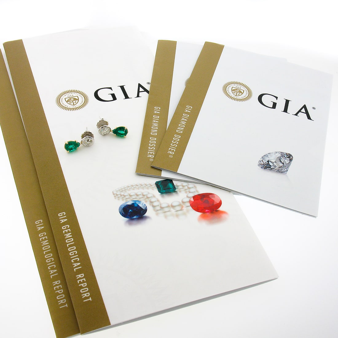 GIA Certified 14k Two Tone Emerald Diamond Drop Earrings: GIA Certified 14k Two Tone Emerald Diamond Drop Earrings These elegant drop dangle earrings are crafted from solid 14k two-tone gold, featuring a combination of white gold tops and yellow gold bottoms
