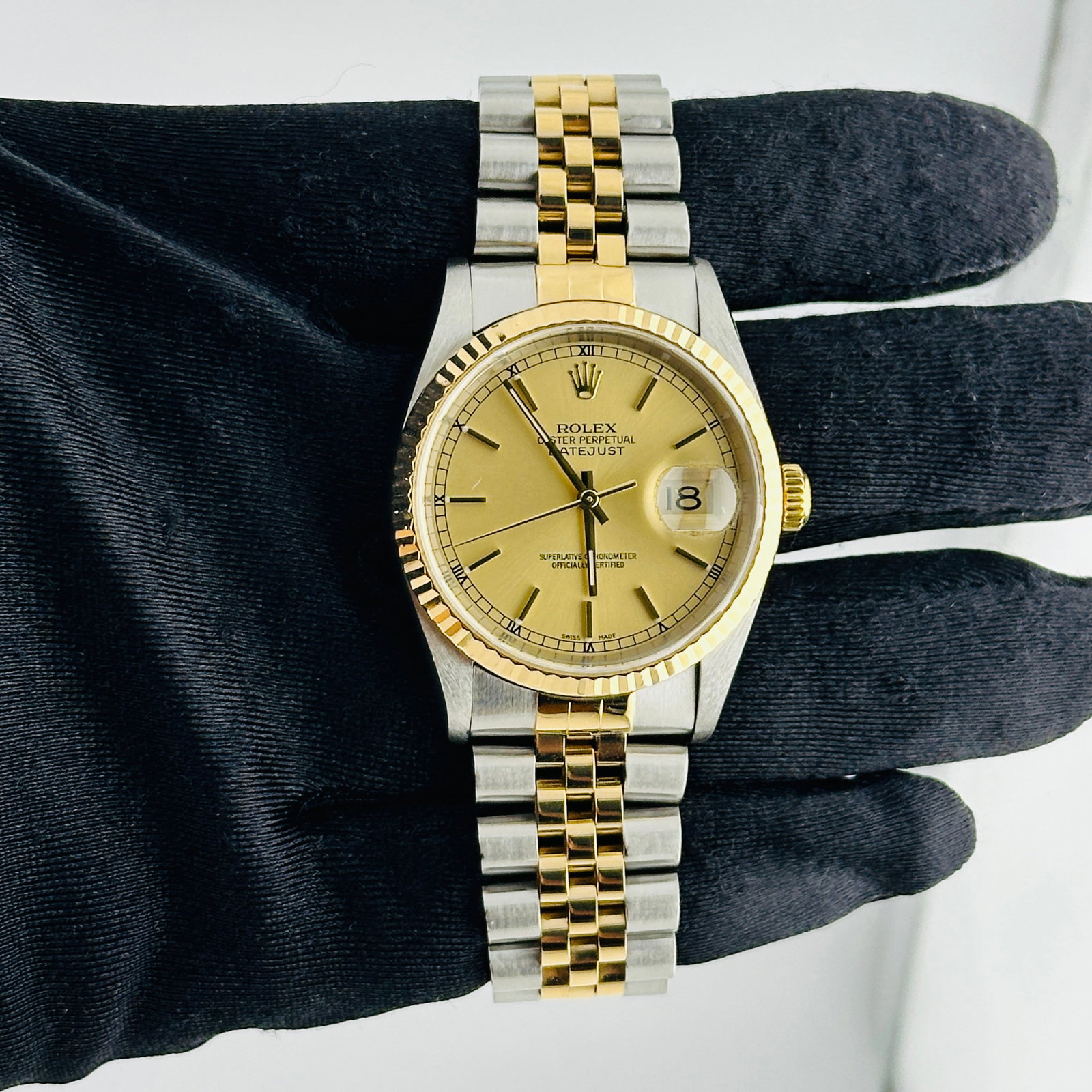 Rolex Champagne Stick Dial Datejust Watch D Link Jubilee Ref 16233: Rolex Champagne Stick Dial Datejust Watch D Link Jubilee Ref 16233 This Rolex Datejust features a champagne stick dial, a fluted bezel, and is paired with a D-Link Jubilee bracelet. It is designed for