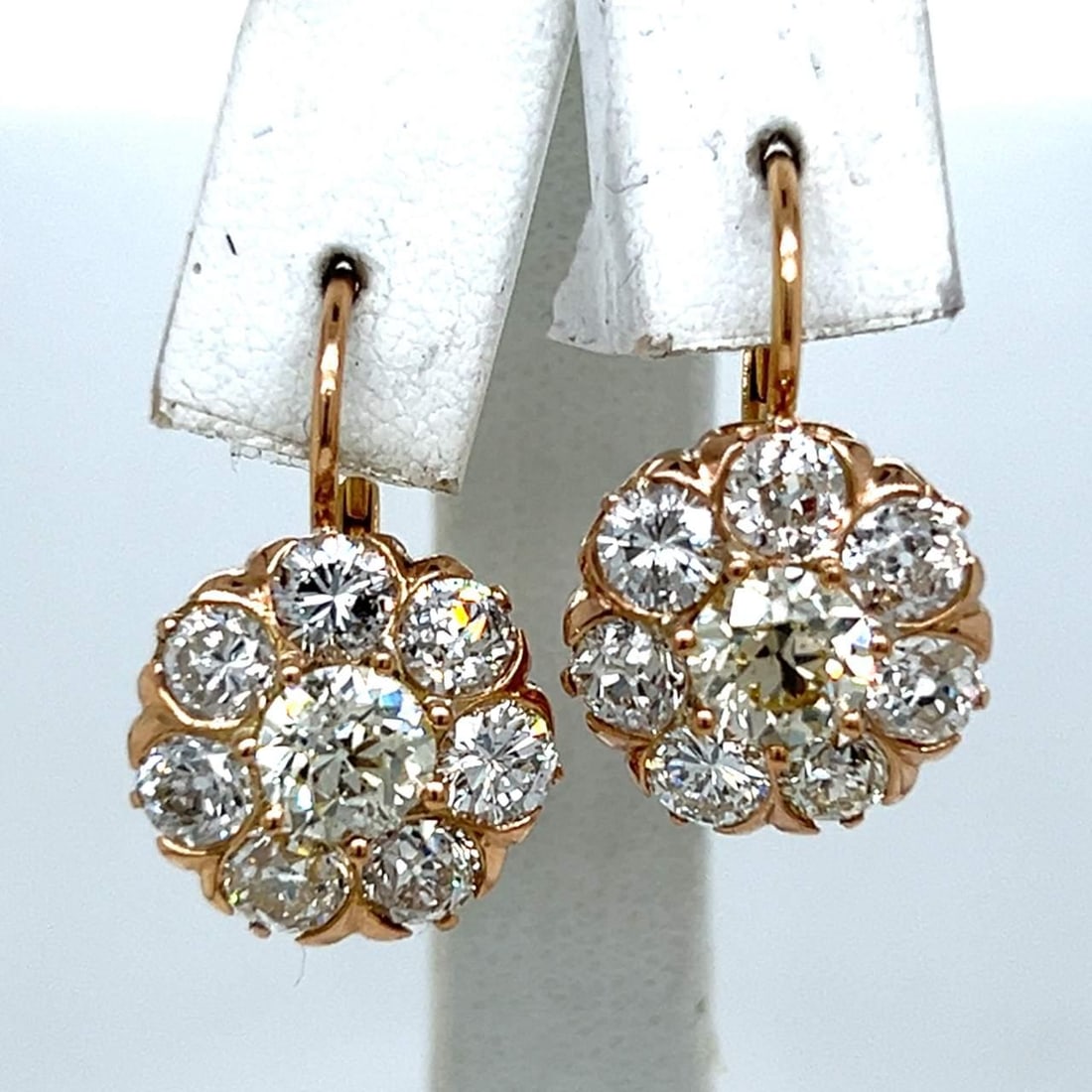 Platinum 18K Yellow Gold 6.05 Ct Old Mine Diamond Earrings: Platinum 18K Yellow Gold 6.05 Ct Old Mine Diamond Earrings Elevate your elegance with these stunning Platinum and 18K Yellow Gold Diamond Earrings. With a total diamond weight of 6.05 carats, these ea