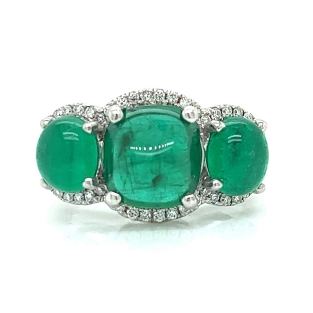 18K White Gold Emerald Diamond Ring 2.57 Ct Center Stone VVS-VS Clarity: 18K White Gold Emerald Diamond Ring 2.57 Ct Center Stone VVS-VS Clarity This stunning 18K white gold ring features a captivating 2.57 Ct. center emerald, flanked by two additional emeralds totaling ap