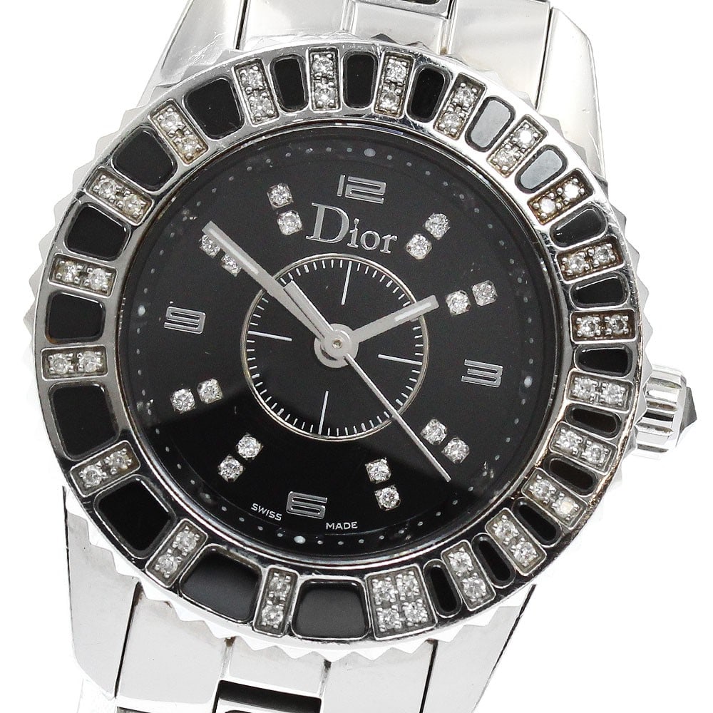 Dior Crystal quartz women s wristwatch diamond bezel 29mm: Dior Crystal quartz women s wristwatch diamond bezel 29mm This Dior Crystal women's wristwatch features a stainless steel and ceramic case and bracelet with a black dial. The bezel is adorned with 16 