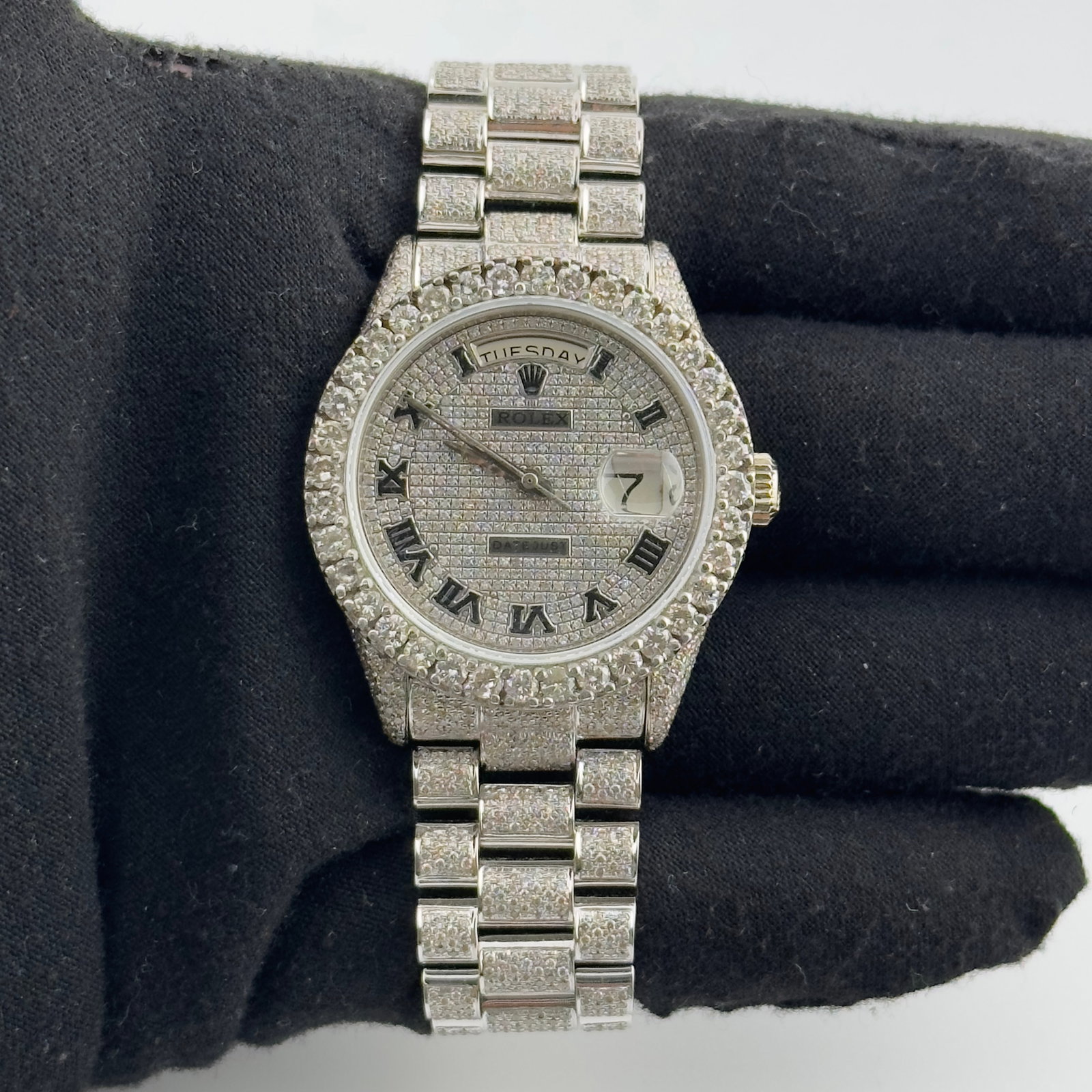 Rolex Day-Date Ref 1803 Diamond Roman Dial Watch with President Style Bracelet: Rolex Day-Date Ref 1803 Diamond Roman Dial Watch with President Style Bracelet This Rolex Day-Date features a Diamond Roman dial and a prong bezel, complemented by a President style bracelet. It is de