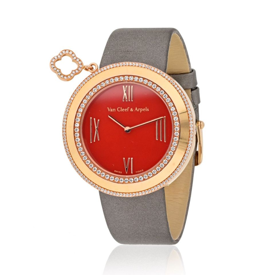 Van Cleef & Arpels 18K Rose Gold Ladies Watch Red Carnelian Dial Diamond Bezel: Van Cleef & Arpels 18K Rose Gold Ladies Watch Red Carnelian Dial Diamond Bezel This exquisite vintage watch from Van Cleef & Arpels features a stunning 18K rose gold construction with a vibrant red ca