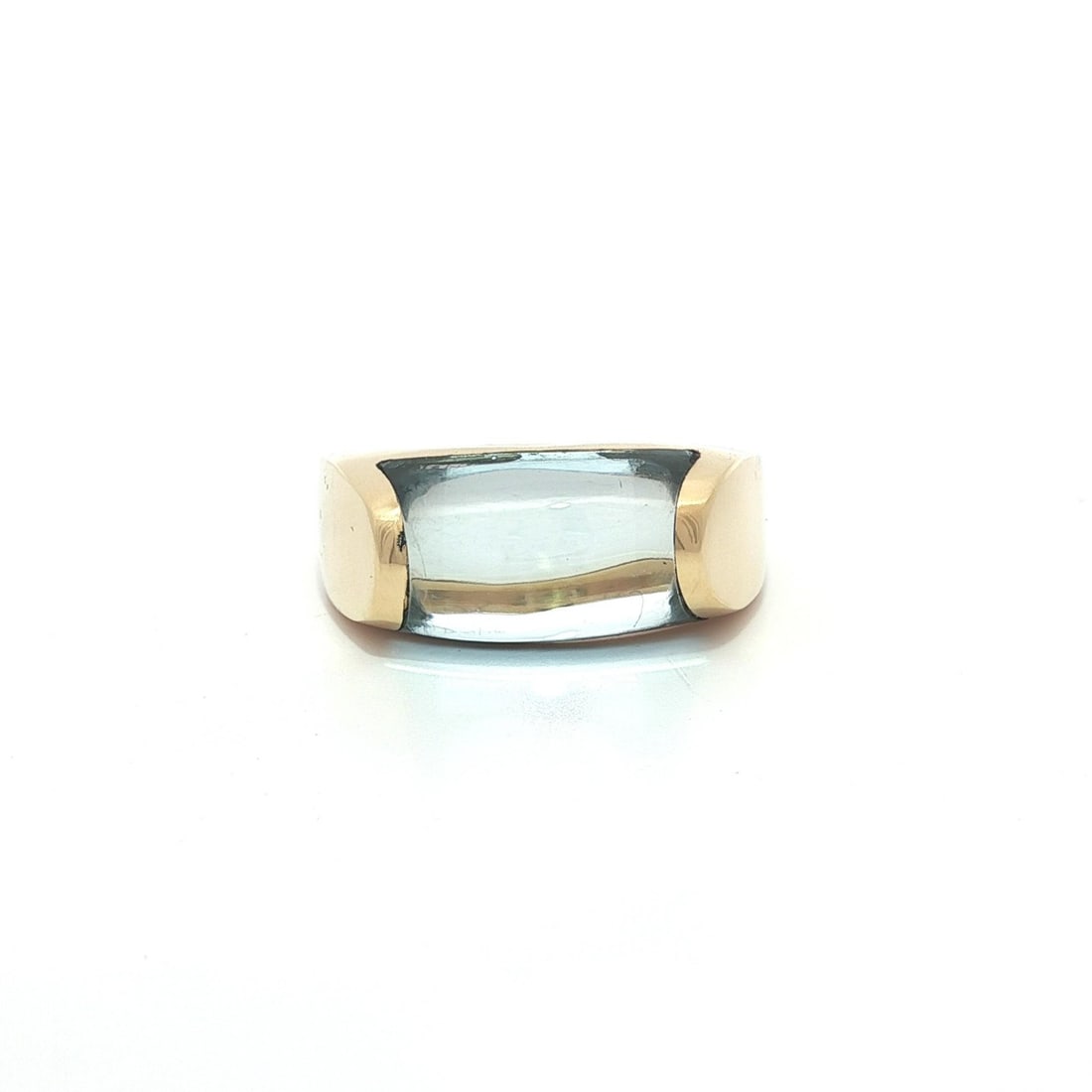 Bvlgari Tronchetto Blue Topaz Band Ring in 18k Yellow Gold: Bvlgari Tronchetto Blue Topaz Band Ring in 18k Yellow Gold Pre-owned Bulgari Tronchetto band ring crafted in solid 18k yellow gold and set with a custom cut natural blue topaz in a channel inlaid sett