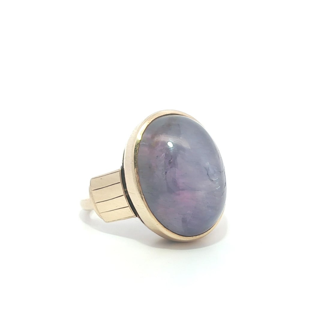 Women's 14k Yellow Gold Bezel Set 32ct Star Sapphire Cocktail Ring: Women's 14k Yellow Gold Bezel Set 32ct Star Sapphire Cocktail Ring Antique handmade cocktail ring featuring a natural purple star sapphire in a bezel-set solitaire design. Crafted in solid 14k yellow 