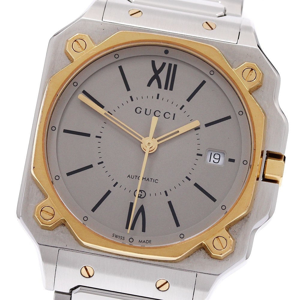 GUCCI G-Flat YA166403 mens automatic date wristwatch: GUCCI G-Flat YA166403 mens automatic date wristwatch Pre-owned Gucci G-Flat automatic men's wristwatch with date display. This Swiss-made watch features a beige dial and an automatic movement. The wat