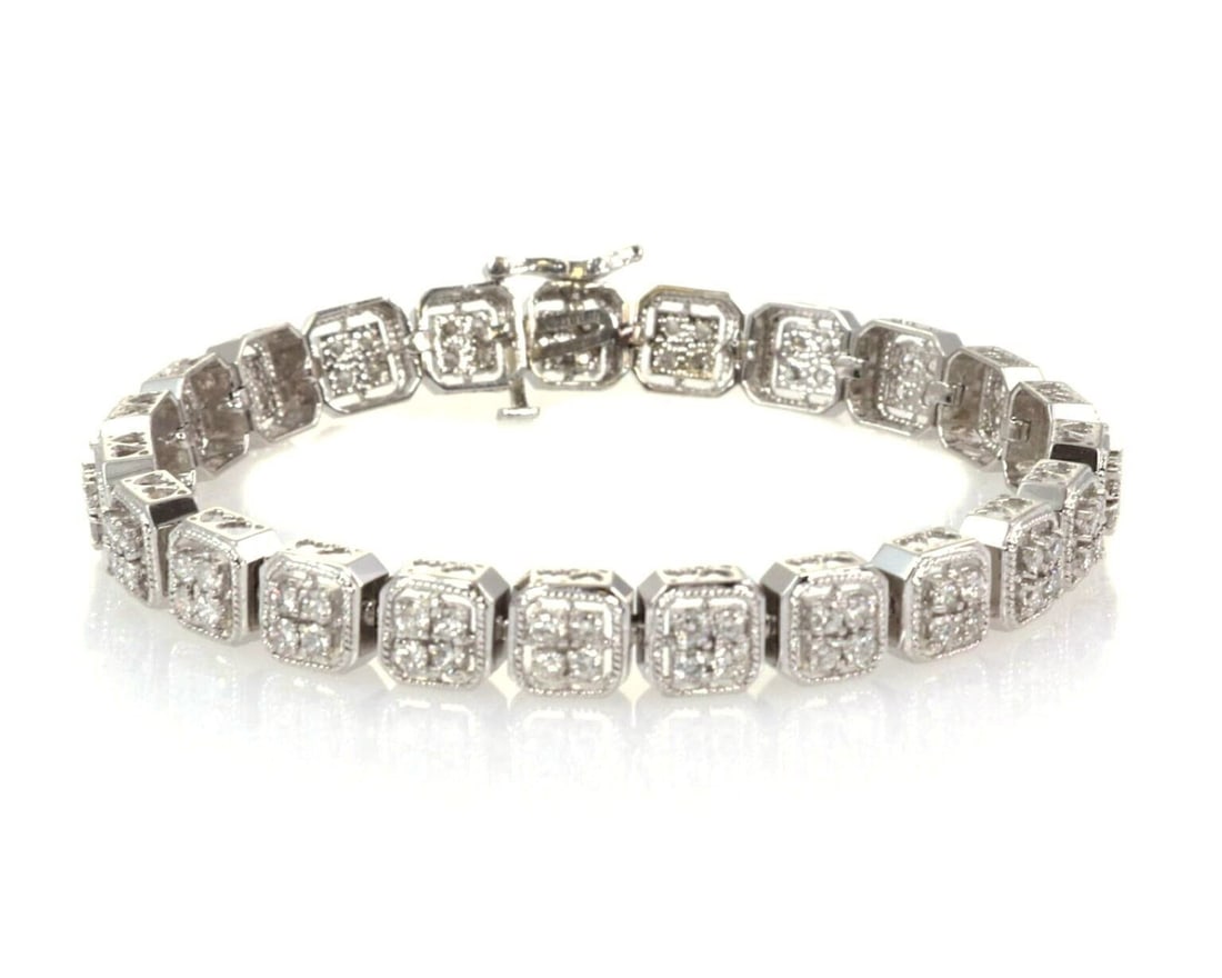 Vintage 14k White Gold Diamond Cushion Link Bracelet 6.75 in: Vintage 14k White Gold Diamond Cushion Link Bracelet 6.75 in Vintage diamond cushion link bracelet crafted in solid 14k white gold. This original bracelet features high-bridge cushion-shaped links wit