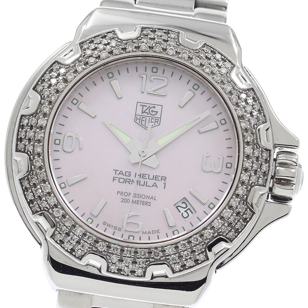 TAG Heuer Formula 1 Women's Quartz Date Watch WAC1216.BA0852: TAG Heuer Formula 1 Women's Quartz Date Watch WAC1216.BA0852 TAG Heuer Formula 1 Date quartz women's wristwatch, pre-owned and made in Switzerland. It features a pink shell dial, stainless steel case 