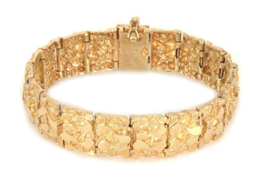 Unbranded 14k Yellow Gold Nugget Link Bracelet 8 Inch Wide: Unbranded 14k Yellow Gold Nugget Link Bracelet 8 Inch Wide Vintage estate nugget link bracelet crafted in solid 14k yellow gold with a wide textured design. This pre-owned bracelet features sculptural