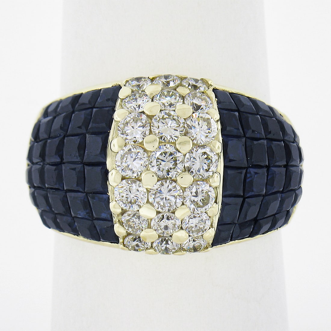 Unbranded 18K Yellow Gold Sapphire Diamond Dome Band Ring 5.23ctw: Unbranded 18K Yellow Gold Sapphire Diamond Dome Band Ring 5.23ctw Wide domed band ring crafted in solid 18K yellow gold, featuring a mystery invisible set arrangement of natural genuine square-cut sap