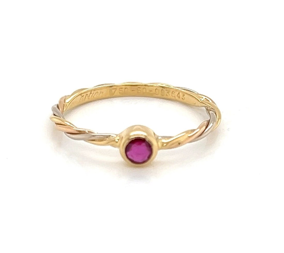 Cartier Trinity 18k Tri Color Gold Ruby Twisted Band Ring Size 50 US 5: Cartier Trinity 18k Tri Color Gold Ruby Twisted Band Ring Size 50 US 5 Authentic Cartier Trinity Ruby Twisted Wire Band Ring crafted in 18k tri-color gold. This fine ring features Cartier's Trinity-in