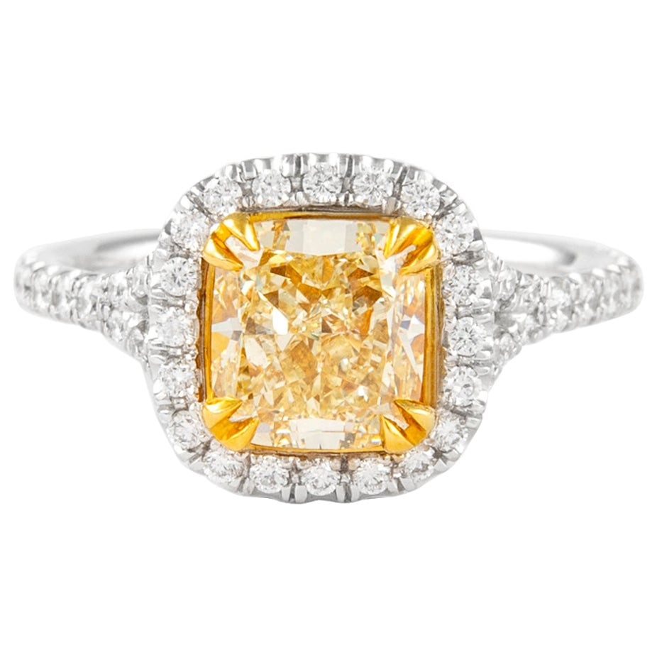 2.07ct Fancy Intense Yellow Diamond Ring 18k Two-Tone EGL Certified: 2.07ct Fancy Intense Yellow Diamond Ring 18k Two-Tone EGL Certified This exquisite ring features a stunning 2.07 ct Fancy Intense Yellow VS1 cushion-cut diamond, EGL certified, set in a contemporary