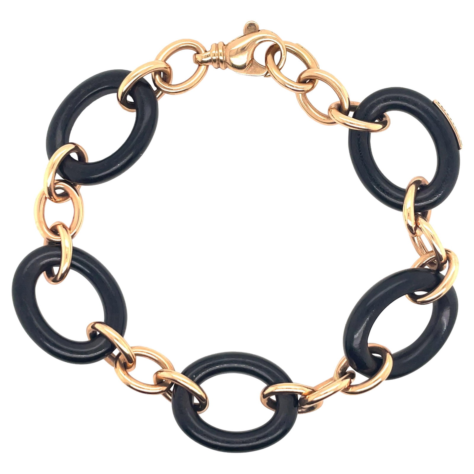 Oromalia Contemporary Ebony Wood and 18K Rose Gold Bracelet 9.25 in: Oromalia Contemporary Ebony Wood and 18K Rose Gold Bracelet 9.25 in This exquisite Oromalia link bracelet showcases a stunning combination of materials, featuring five ebony wood links elegantly inter