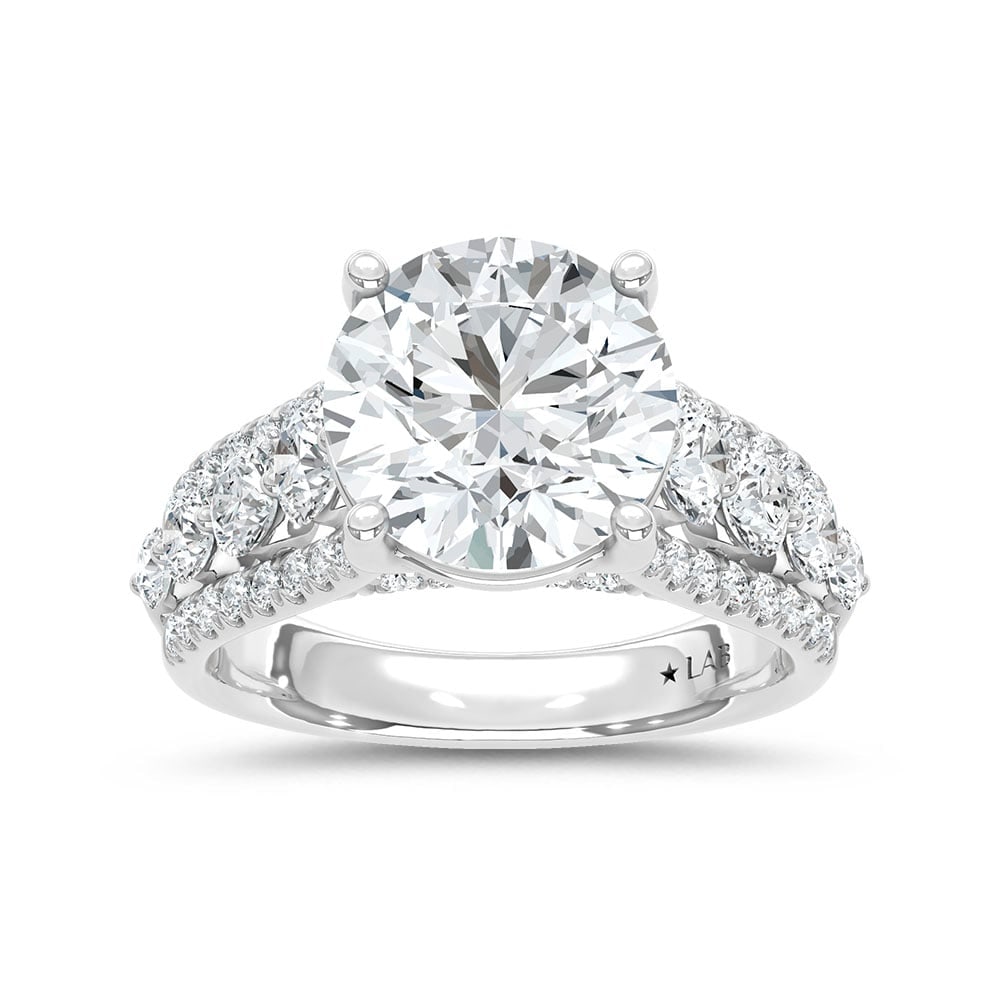 14K White Gold Lab Grown Diamond 6 1/5 Ct.Tw. Engagement Ring (Center 5ct): 14K White Gold Lab Grown Diamond 6 1/5 Ct.Tw. Engagement Ring (Center 5ct) 14k White Gold Stone Color: D-f Stone Clarity: Vs Each ring is presented in standard size 6.5. Complimentary resizing is avai