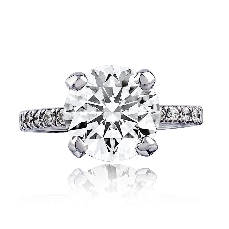 14K White Gold Engagement Ring 3.02ct GIA Round Diamond K VS1: 14K White Gold Engagement Ring 3.02ct GIA Round Diamond K VS1 This pre-owned engagement ring is crafted in 14K white gold and features a 3.02 ct round cut natural center diamond with K color and VS1 c