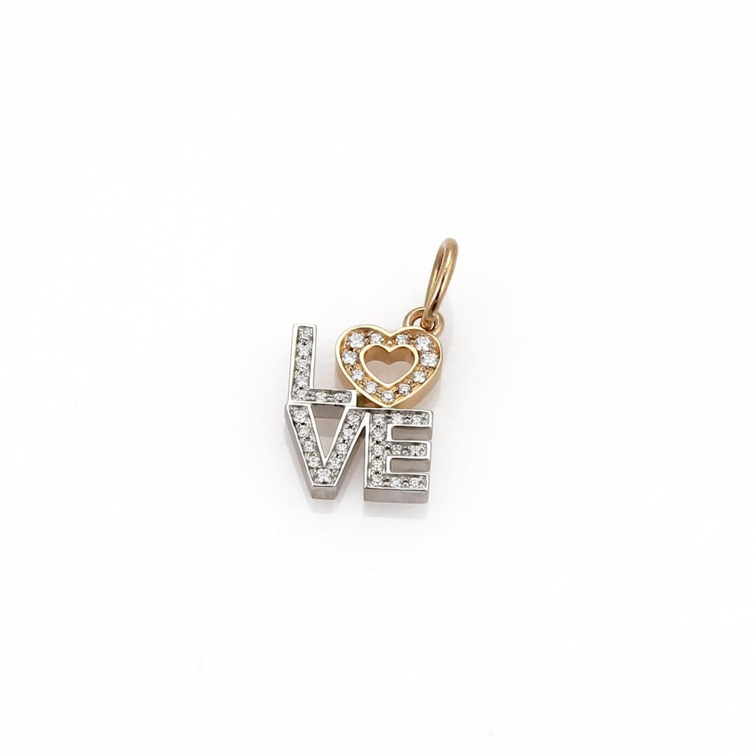 Tiffany & Co. LOVE Pendant 18k White Rose Gold with Diamonds: Tiffany & Co. LOVE Pendant 18k White Rose Gold with Diamonds Elevate your jewelry collection with this exquisite Tiffany & Co. LOVE pendant. Crafted from a luxurious blend of 18k white and rose gold, 