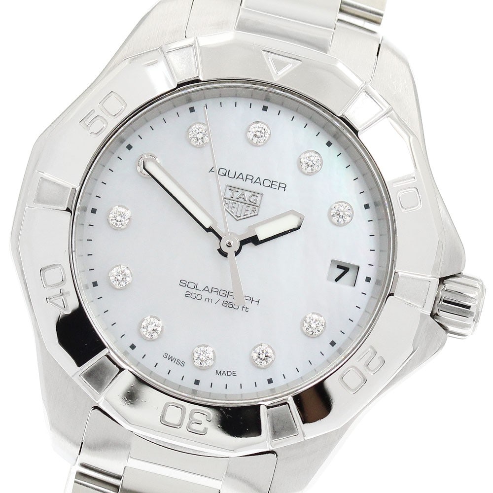 TAG Heuer Aquaracer Solargraph WBP1313.BA0005 11P Diamond Wristwatch: TAG Heuer Aquaracer Solargraph WBP1313.BA0005 11P Diamond Wristwatch Pre-owned TAG Heuer Aquaracer Solargraph wristwatch with a white shell dial, solar movement, and date display. This unisex watch fe