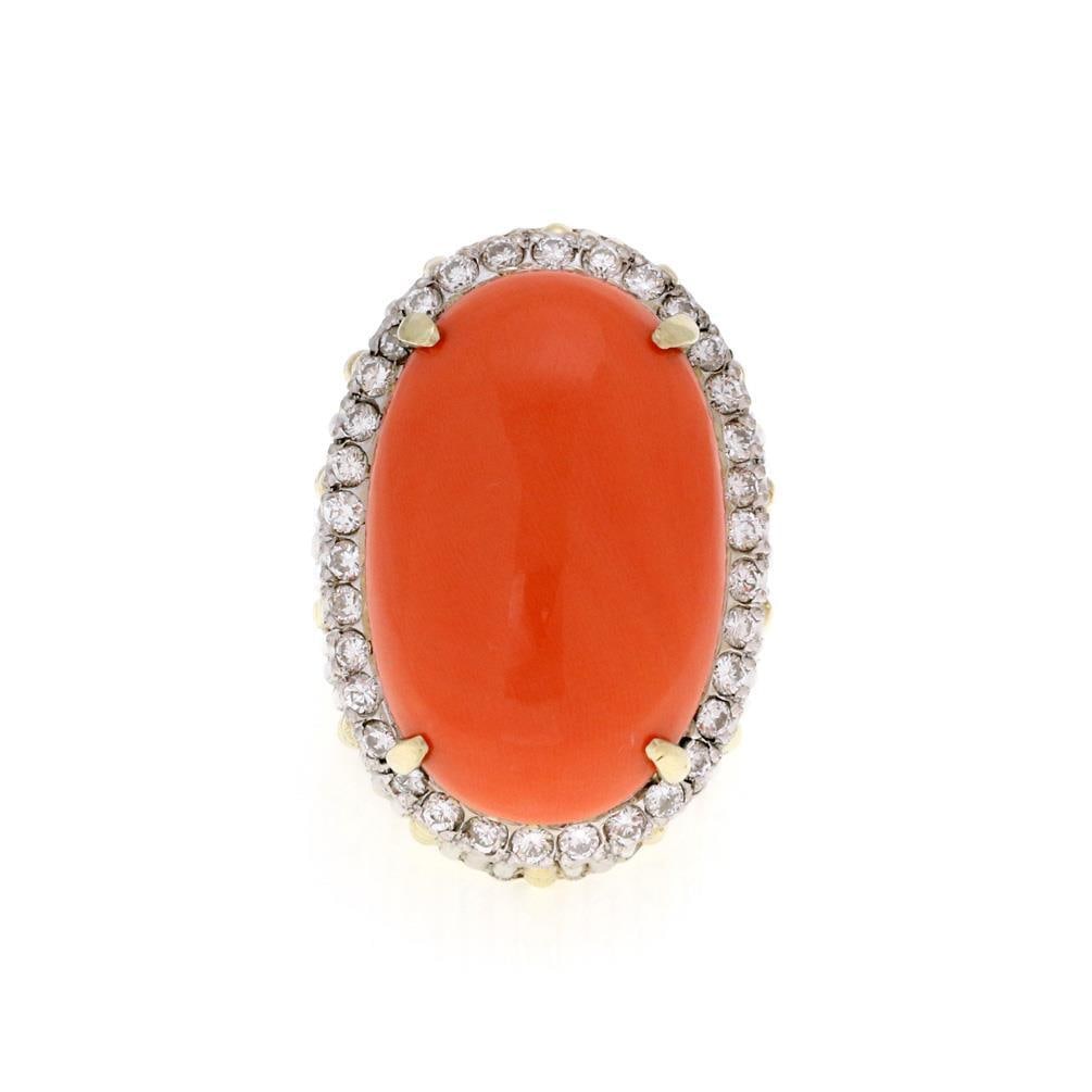 Vintage 14k Gold 1ct Diamond Coral Oval Ring Size 6.5: Vintage 14k Gold 1ct Diamond Coral Oval Ring Size 6.5 This striking vintage ring showcases an impressive design, expertly crafted from 14k yellow and white gold. The wide shank features alternating wh