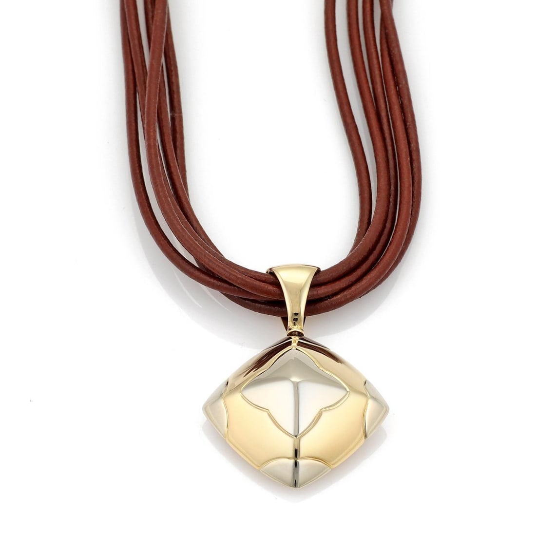 Bvlgari Pyramide 18k Gold Floral Pendant Necklace with Leather Cord: Bvlgari Pyramide 18k Gold Floral Pendant Necklace with Leather Cord Elevate your jewelry collection with this stunning necklace from Bvlgari's PYRAMIDE collection. Crafted with exquisite 18k yellow an