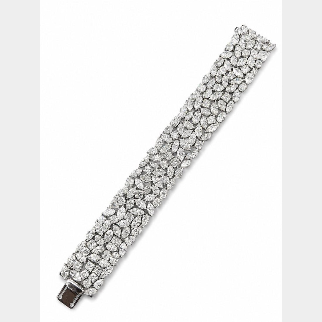 Diamond Bracelet in Platinum and 18K White Gold 81.50 Ct: Diamond Bracelet in Platinum and 18K White Gold 81.50 Ct A pre-owned diamond bracelet crafted in platinum and 18K white gold. It is set with 147 diamonds totaling approximately 81.50 ct, with F-I colo