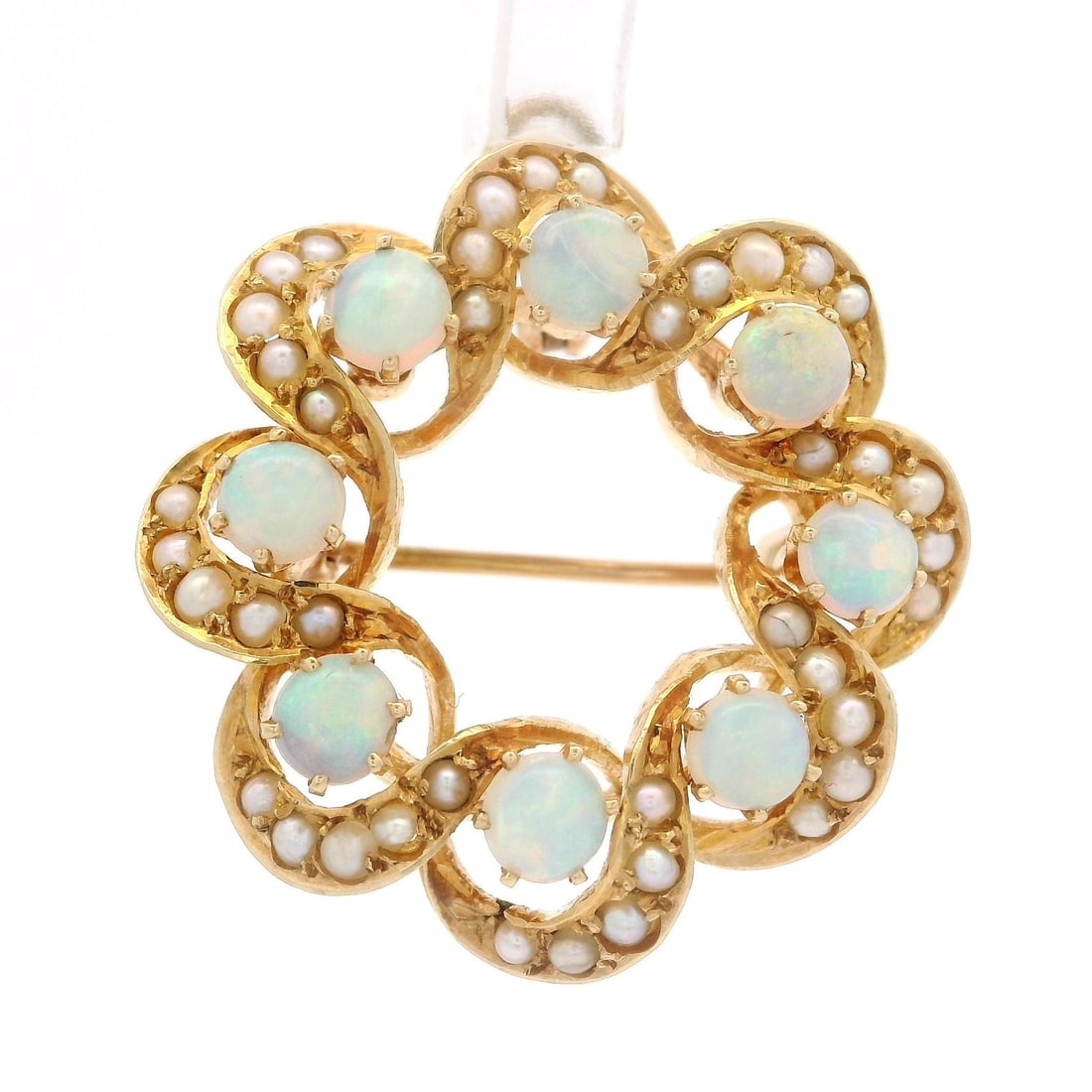 Victorian Yellow Gold Opal Seed Pearl Swirl Brooch Pendant: Victorian Yellow Gold Opal Seed Pearl Swirl Brooch Pendant This exquisite antique Victorian pin brooch pendant showcases a stunning swirl wreath design crafted in solid 13-14k yellow gold. The centerp