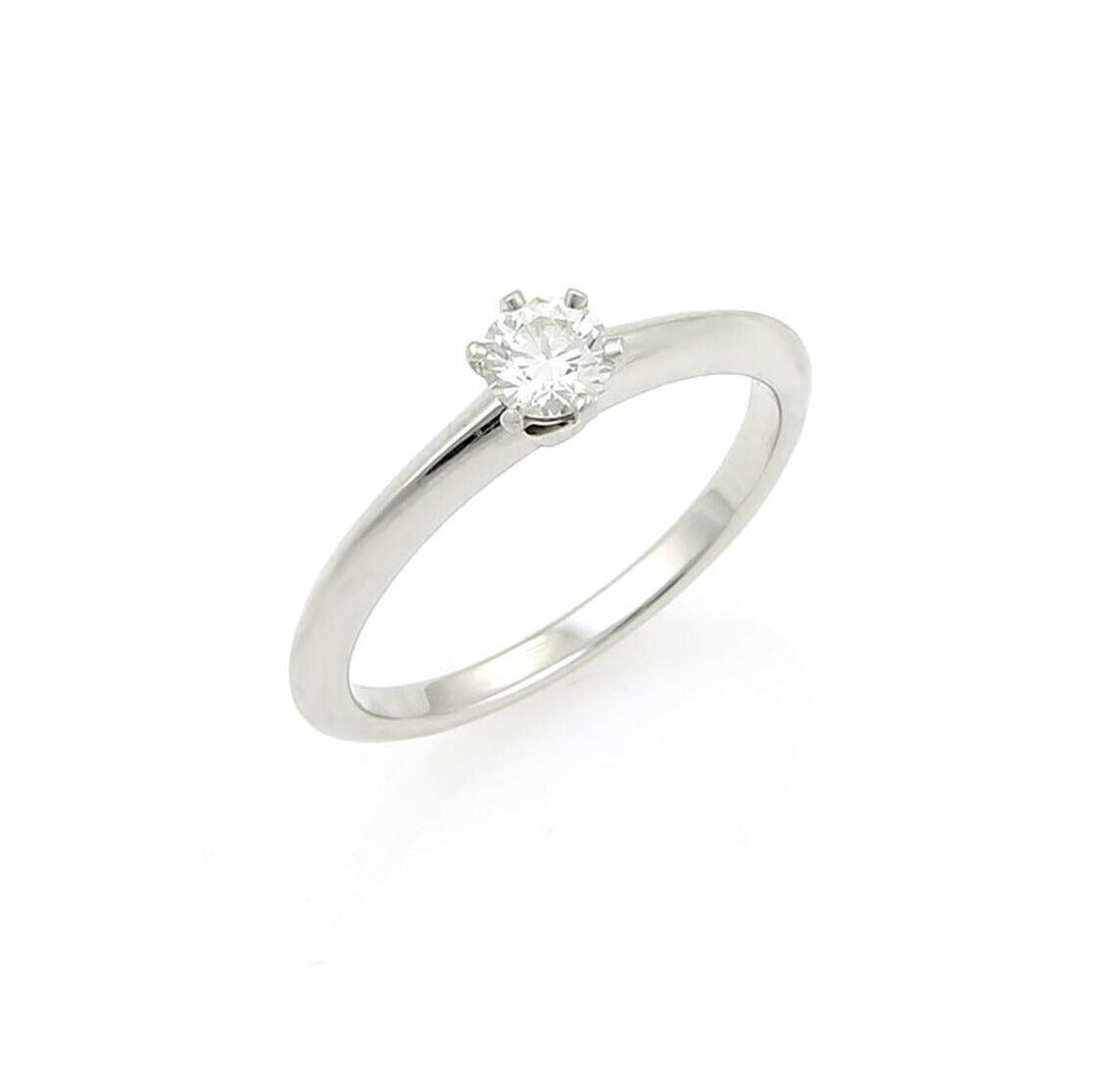 Tiffany & Co. Diamond Solitaire Ring in Platinum 0.25ct Size 6 with Box Cert: Tiffany & Co. Diamond Solitaire Ring in Platinum 0.25ct Size 6 with Box Cert Pre-owned Tiffany & Co. diamond solitaire ring crafted in platinum with a classic solitaire setting. The ring features one 