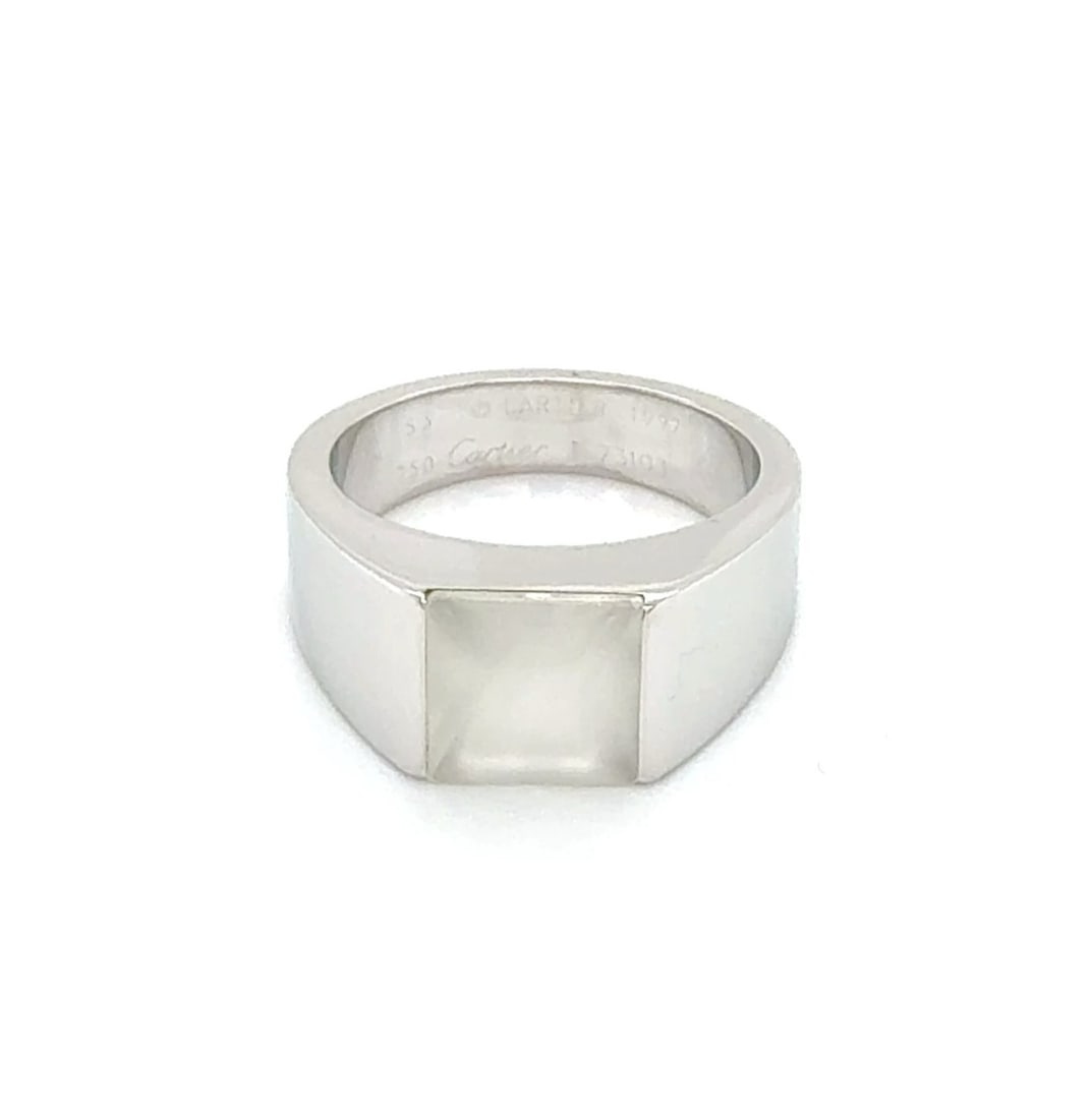 Cartier Tank Moonstone Ring in 18k White Gold US 6.75 EU 53: Cartier Tank Moonstone Ring in 18k White Gold US 6.75 EU 53 Authentic Cartier Tank Moonstone ring crafted in 18k white gold, featuring a natural cabochon moonstone in a sculptural Tank-style design. T