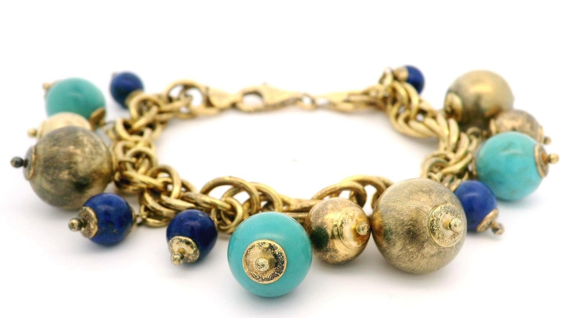 Vintage Italian Sterling Silver Vermeil Lapis Turquoise Dangle Bracelet: Vintage Italian Sterling Silver Vermeil Lapis Turquoise Dangle Bracelet This exquisite vintage bracelet showcases the artistry of Italian craftsmanship, featuring natural gemstones including three vib