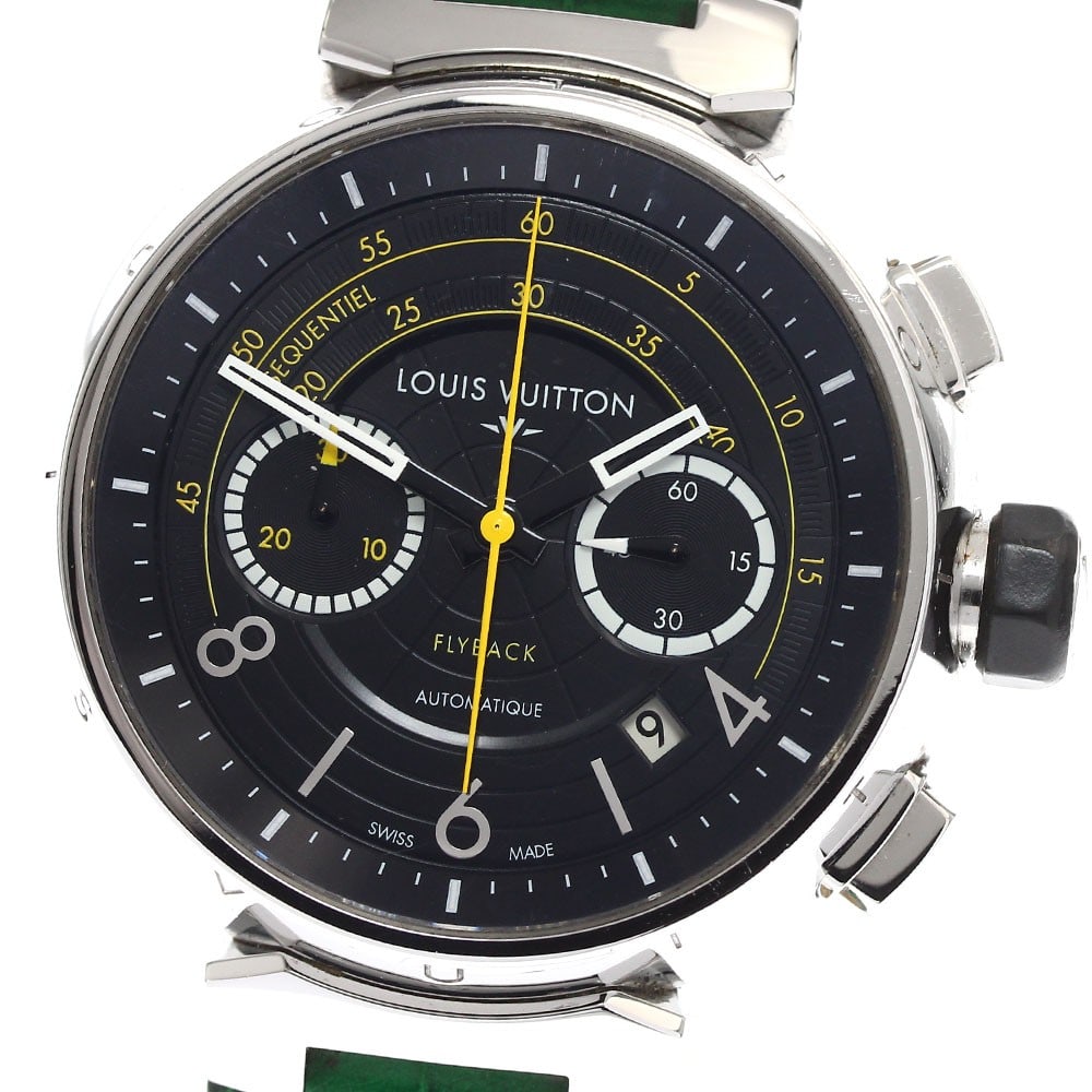 Louis Vuitton Q102B Tambour mens flyback chronograph wristwatch: Louis Vuitton Q102B Tambour mens flyback chronograph wristwatch Pre-owned Louis Vuitton Tambour Flyback Chronograph men's wristwatch with automatic movement and black dial. This limited edition model 