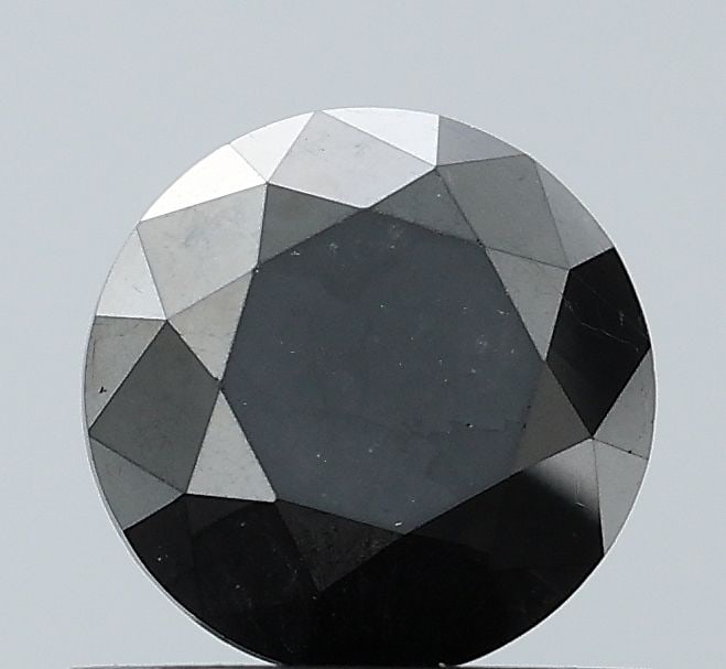 Loose Diamond - ROUND 0.91ct Fancy Black VVS2: Loose Diamond - ROUND 0.91ct Fancy Black VVS2 Source: Natural Shape: ROUND Carats: 0.91 Color: Fancy Black Certification: NONE Video: