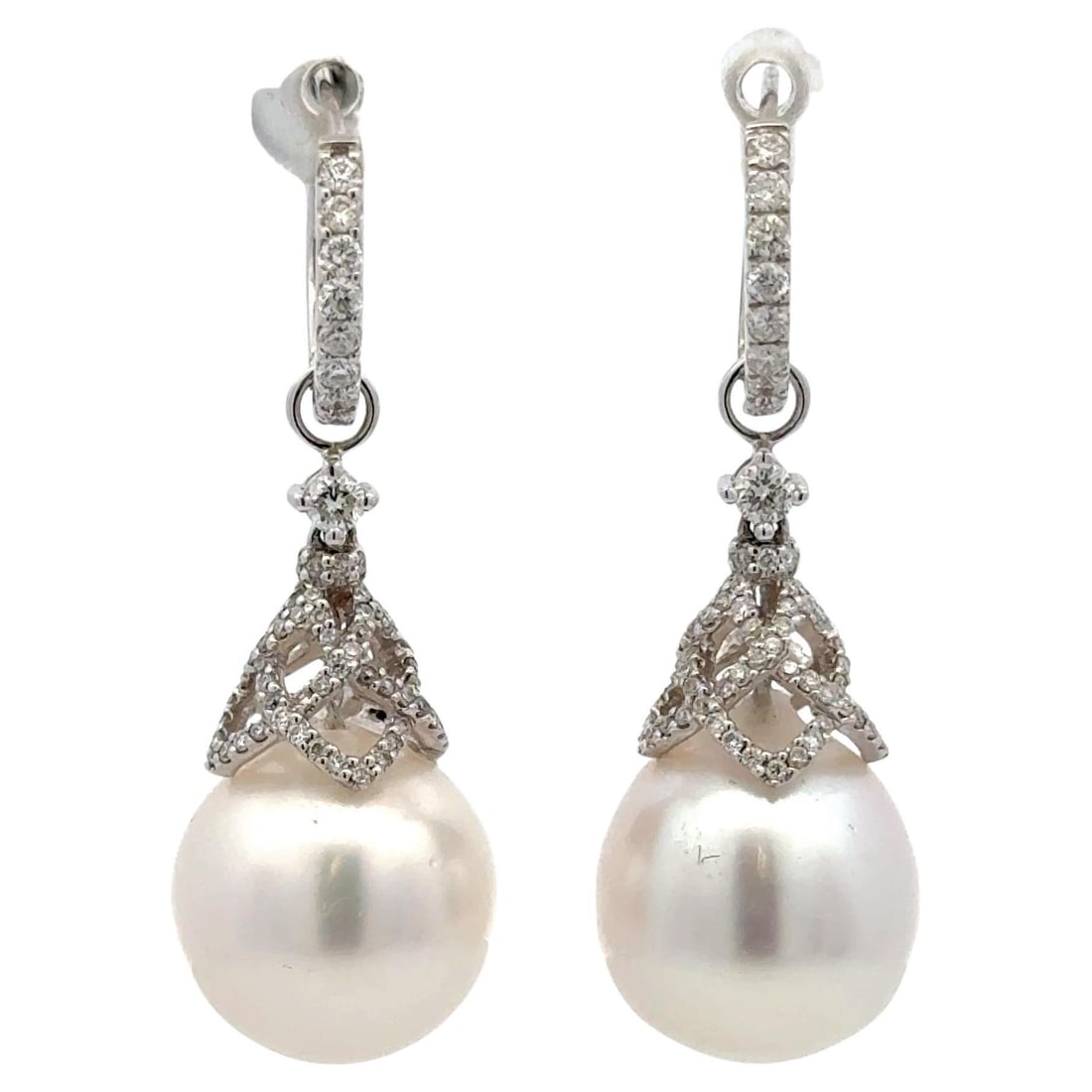 Harbor Diamonds 18K White Gold South Sea Pearl Diamond Drop Earrings 0.97 CT: Harbor Diamonds 18K White Gold South Sea Pearl Diamond Drop Earrings 0.97 CT Elevate your elegance with these stunning South Sea Pearl Diamond Drop Earrings. Crafted from luxurious 18 karat white gold