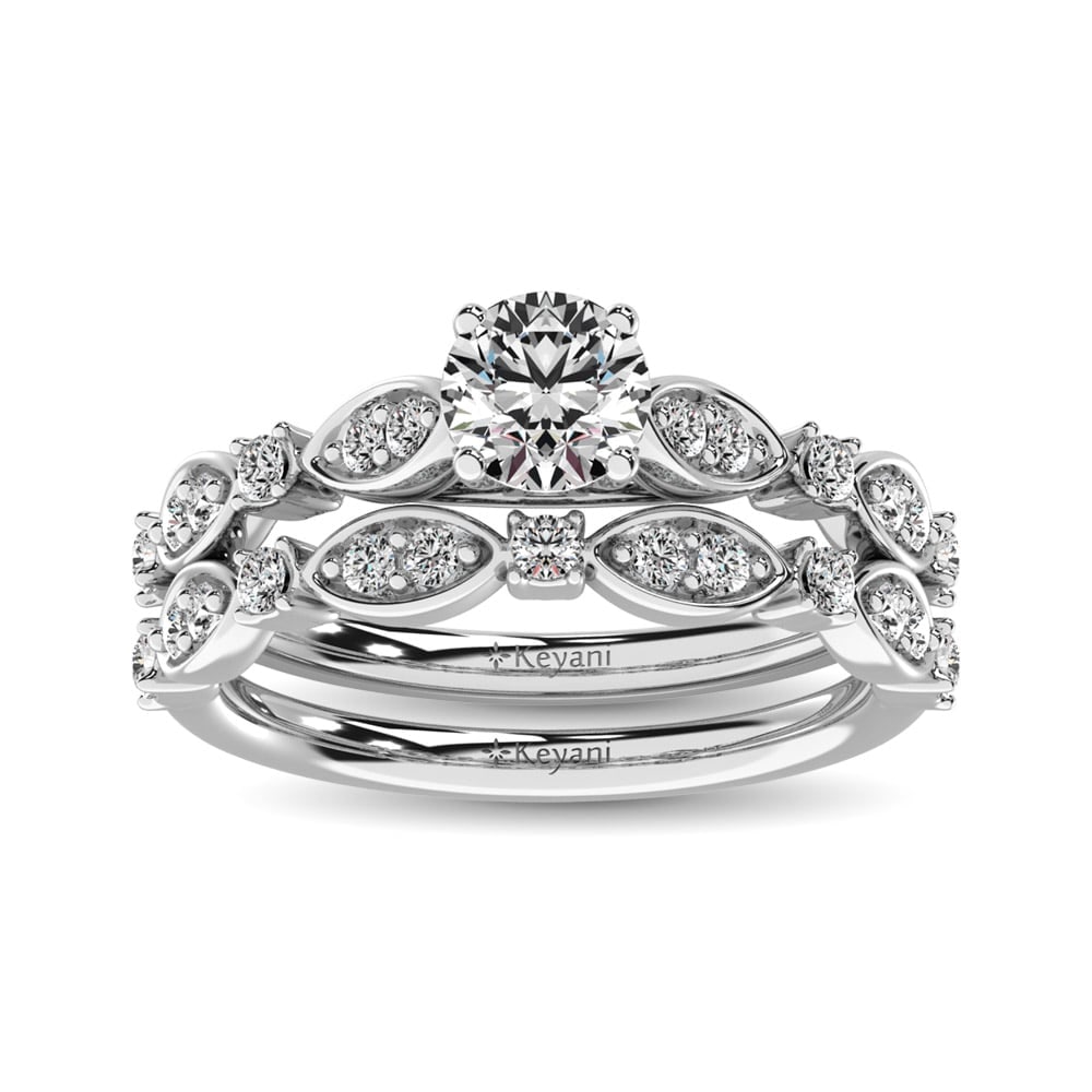 Diamond 3/4 Ct.Tw. Bridal Ring in 14K White Gold: Diamond 3/4 Ct.Tw. Bridal Ring in 14K White Gold 14k White Gold Stone Color: G-h Stone Clarity: Si2 Each ring is presented in standard size 6.5. Complimentary resizing is available between sizes 510 (
