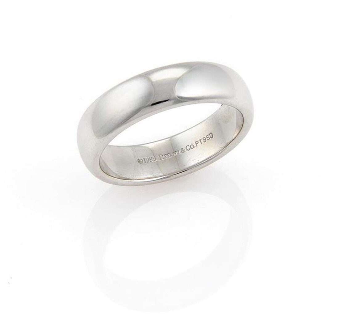 Tiffany & Co. Classic Polished PT950 Wedding Band Ring 9.5: Tiffany & Co. Classic Polished PT950 Wedding Band Ring 9.5 Authentic Tiffany & Co. wedding band ring in polished PT950 platinum with a classic minimalist design. This signed ring has a substantial fee