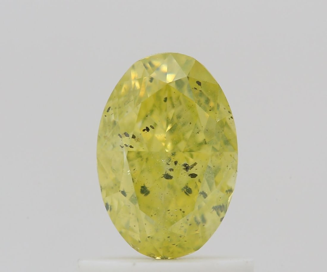 Loose Diamond - OVAL 1.01ct Fancy Intense Greenish Yellow I1: Loose Diamond - OVAL 1.01ct Fancy Intense Greenish Yellow I1 Source: Natural Shape: OVAL Carats: 1.01 Color: Fancy Intense Greenish Yellow Certification: GIA Video: