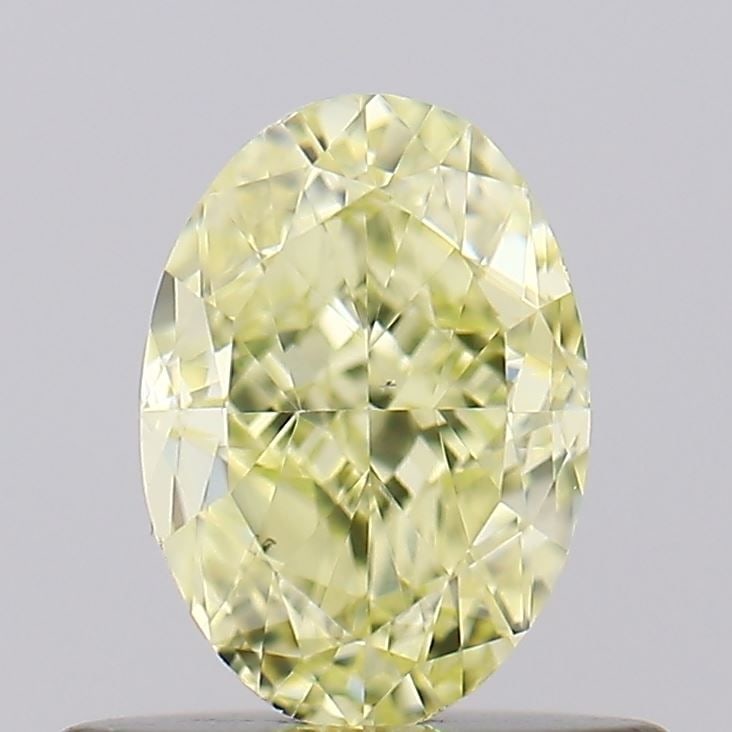 Loose Diamond - OVAL 0.7ct Fancy Light Yellow VS2: Loose Diamond - OVAL 0.7ct Fancy Light Yellow VS2 Source: Natural Shape: OVAL Carats: 0.7 Color: Fancy Light Yellow Certification: GIA Video: