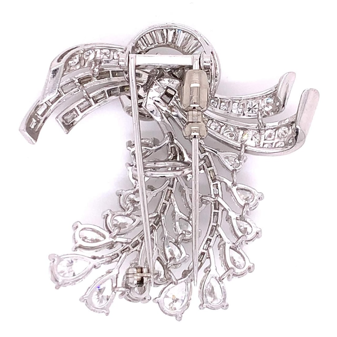 Art Deco Platinum Diamond Brooch 12.40 Ct with Pear Baguette Round Stones: Art Deco Platinum Diamond Brooch 12.40 Ct with Pear Baguette Round Stones This exquisite Art Deco brooch features a stunning array of diamonds set in luxurious platinum. The piece boasts a total diamo