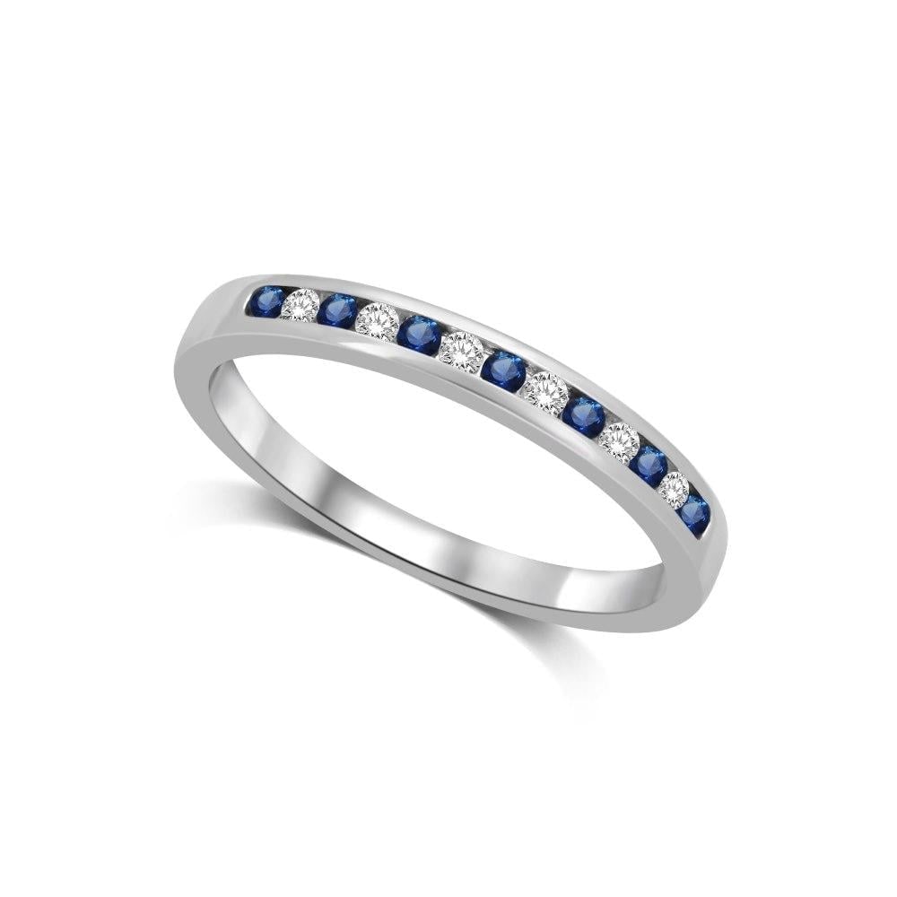 14K White Gold 1/5 Ct.tw Blue Sapphire & Diamond Machine Band: 14K White Gold 1/5 Ct.tw Blue Sapphire & Diamond Machine Band 14K White Gold Machine Band Set with 7 round cut 1/5 Ct.Tw. Blue Sapphires and 6 diamonds in channel setting. 14k White Gold Stone Color: 