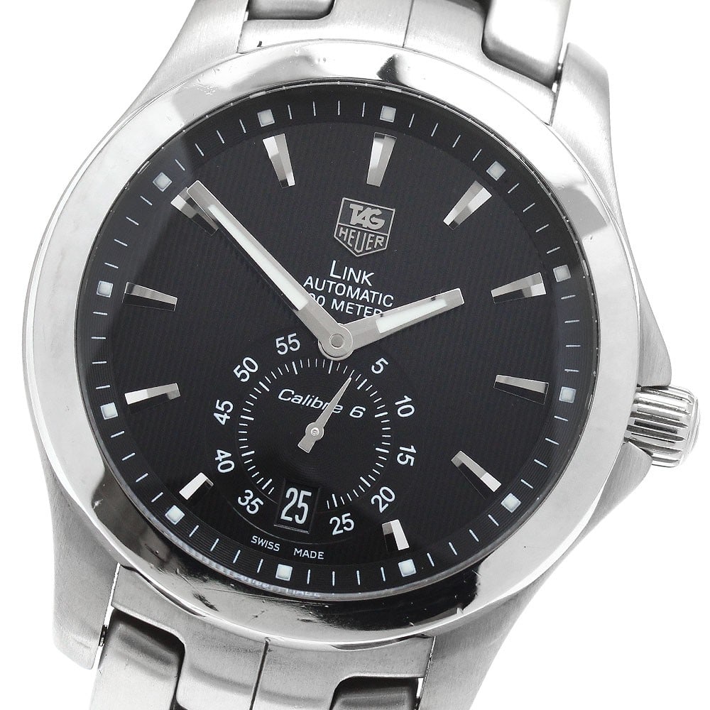 TAG Heuer Link Caliber 6 Automatic Black Dial Mens Date Watch: TAG Heuer Link Caliber 6 Automatic Black Dial Mens Date Watch This TAG Heuer Link Caliber 6 Date Automatic men's wristwatch features a black dial and stainless steel case and bracelet. The watch is po