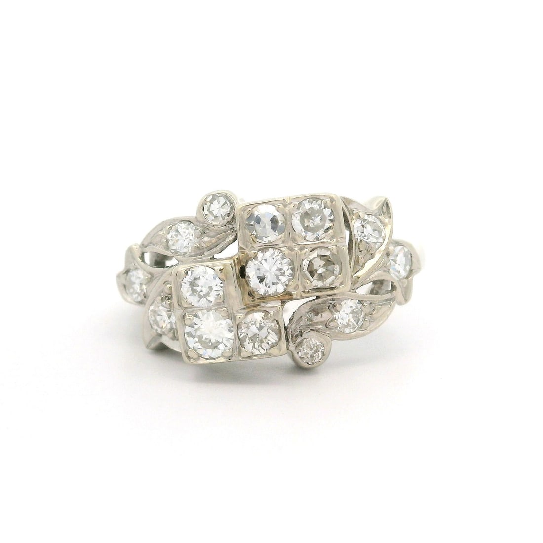 Vintage Retro 14k White Gold 0.65ctw Diamond Floral Ring: Vintage Retro 14k White Gold 0.65ctw Diamond Floral Ring This exquisite Vintage Retro ring features a stunning geometric floral design crafted from solid 14k white gold. Adorned with 15 natural genuin