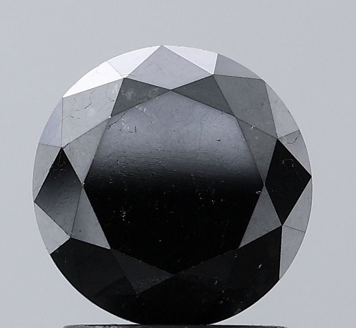 Loose Diamond - ROUND 1.84ct Fancy Black VS1: Loose Diamond - ROUND 1.84ct Fancy Black VS1 Source: Natural Shape: ROUND Carats: 1.84 Color: Fancy Black Certification: NONE Video:
