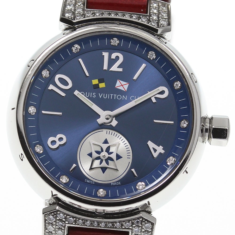 Louis Vuitton Tambour Lovely Cup Lug Q12M4 Womens Quartz Watch: Louis Vuitton Tambour Lovely Cup Lug Q12M4 Womens Quartz Watch A pre-owned Louis Vuitton Tambour Lovely Cup ladies wristwatch with a navy dial, stainless steel case, and leather belt. It features a qu