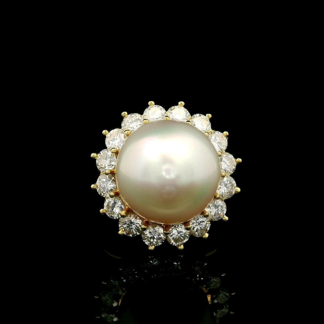 Handmade Solid Yellow Gold 13.2mm Pearl Diamond Halo Ring: Handmade Solid Yellow Gold 13.2mm Pearl Diamond Halo Ring This exquisite handmade cocktail ring features a stunning 13.2mm round cultured pearl, showcasing a beautiful white color with a subtle pink o