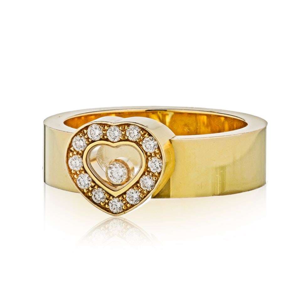 Chopard Happy Diamonds 18K Yellow Gold Heart Ring with Floating Diamonds: Chopard Happy Diamonds 18K Yellow Gold Heart Ring with Floating Diamonds This exquisite Chopard Happy Diamonds ring is crafted from solid 18K yellow gold, weighing approximately 14 grams. Featuring a 