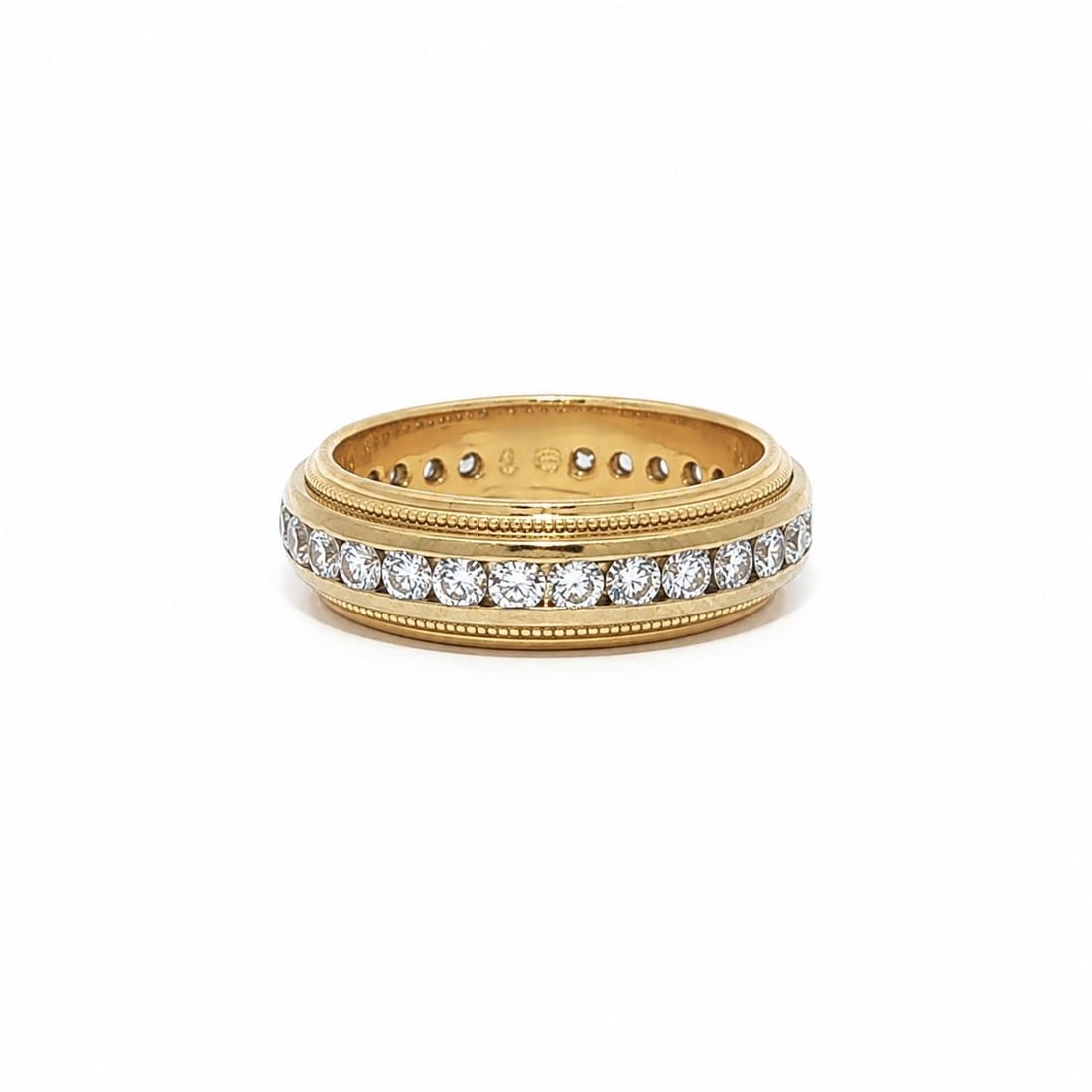 Unbranded 18k Yellow Gold Eternity Band Ring with Channel Set Diamonds Size 7: Unbranded 18k Yellow Gold Eternity Band Ring with Channel Set Diamonds Size 7 This women's wedding and anniversary band features 31 natural genuine round brilliant cut diamonds in a channel-set eterni