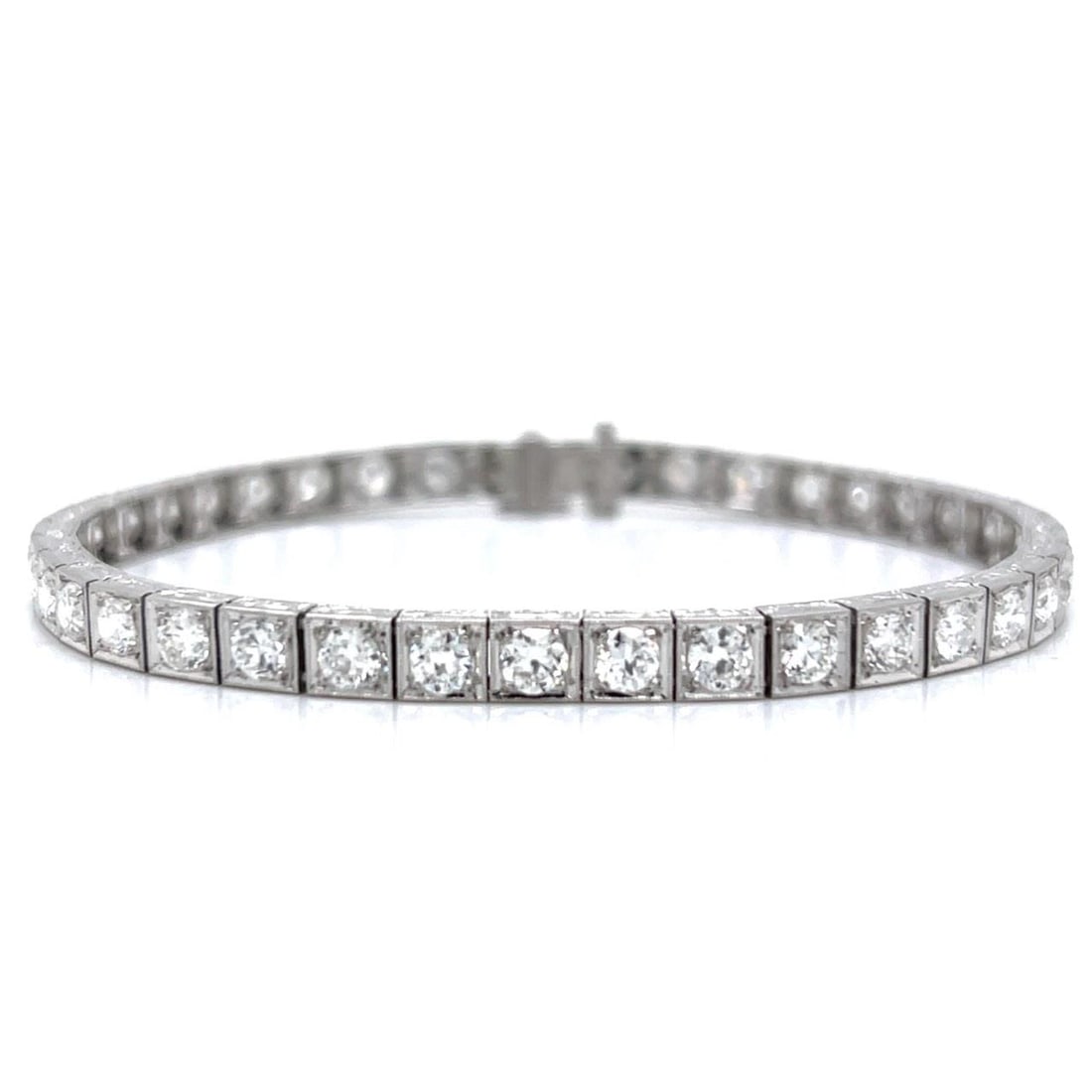 Art Deco Platinum Tennis Bracelet 5.20 Ct Diamonds 40 Stones: Art Deco Platinum Tennis Bracelet 5.20 Ct Diamonds 40 Stones This exquisite Art Deco diamond tennis bracelet is crafted in platinum and features 40 shimmering European-cut diamonds, with a total weigh