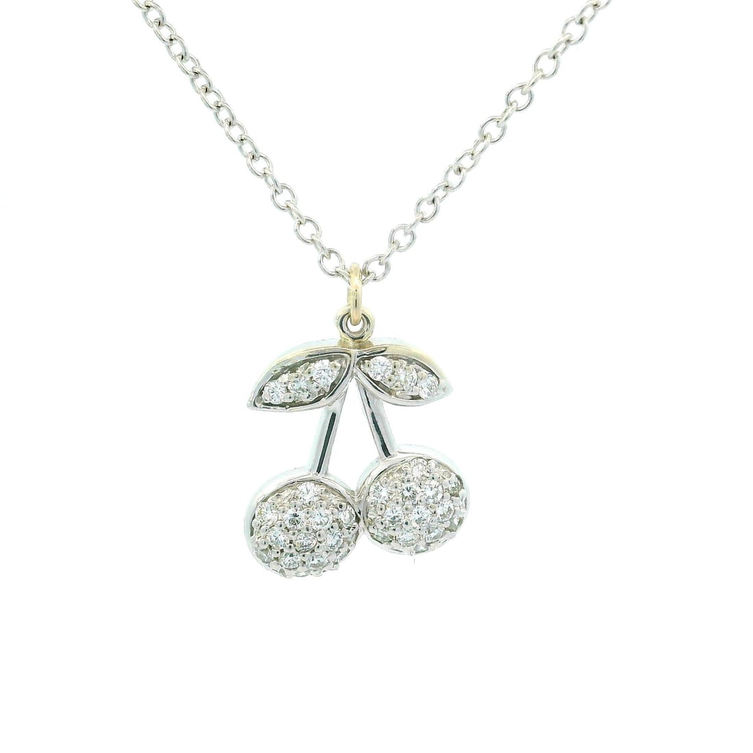 14k White Gold 0.25ctw Diamond Cherry Pendant Necklace: 14k White Gold 0.25ctw Diamond Cherry Pendant Necklace This exquisite necklace features a stunning dual lucky cherry pendant crafted from 14k white gold, elegantly suspended on a 16-inch cable chain. 